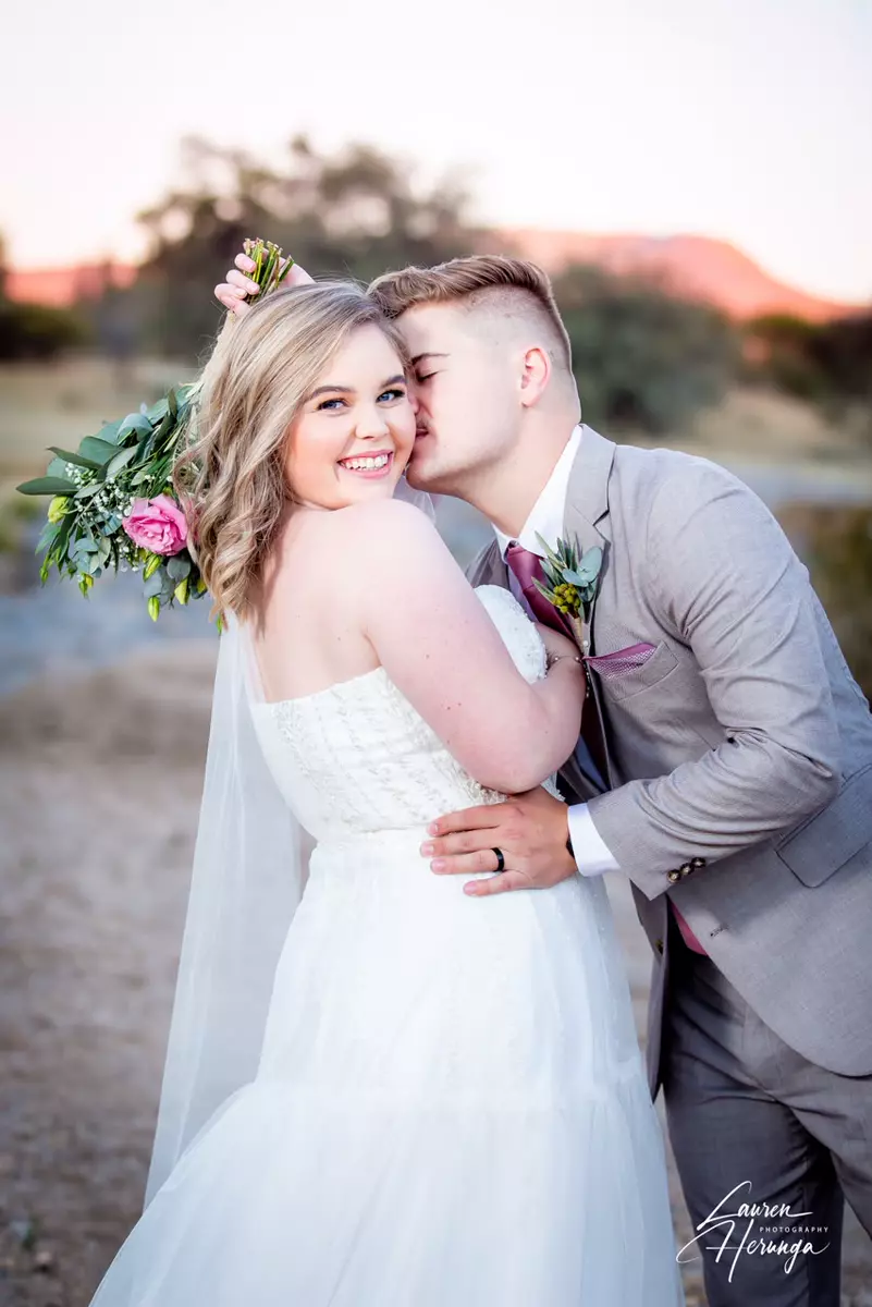Bride and groom outdoors on their wedding day