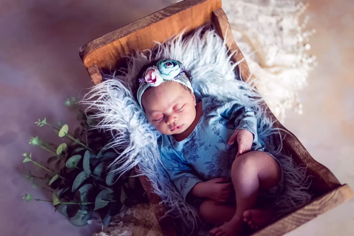 Sleeping newborn baby girl
