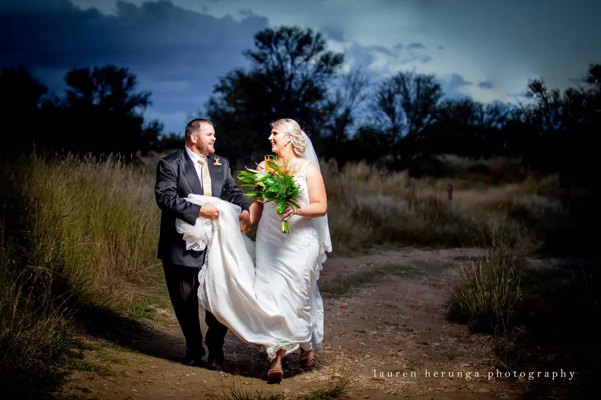 Wedding couple walking outdoors